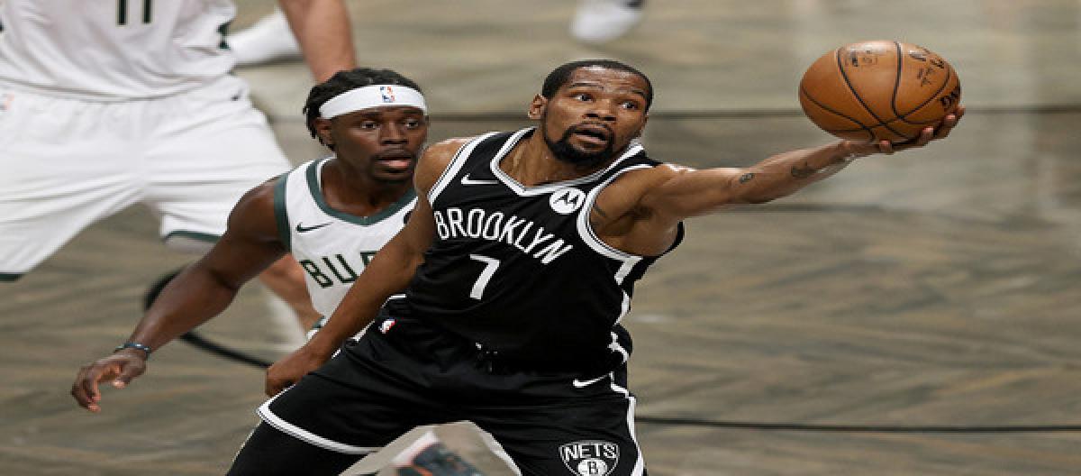 Durant believes he will join the Spurs in a trade that could include Vassell and a first-round pick