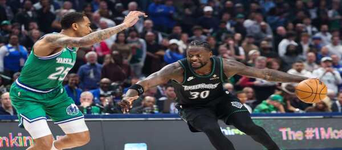 Randle's 31 points put the Timberwolves to a 118-105 victory over the Mavericks.
