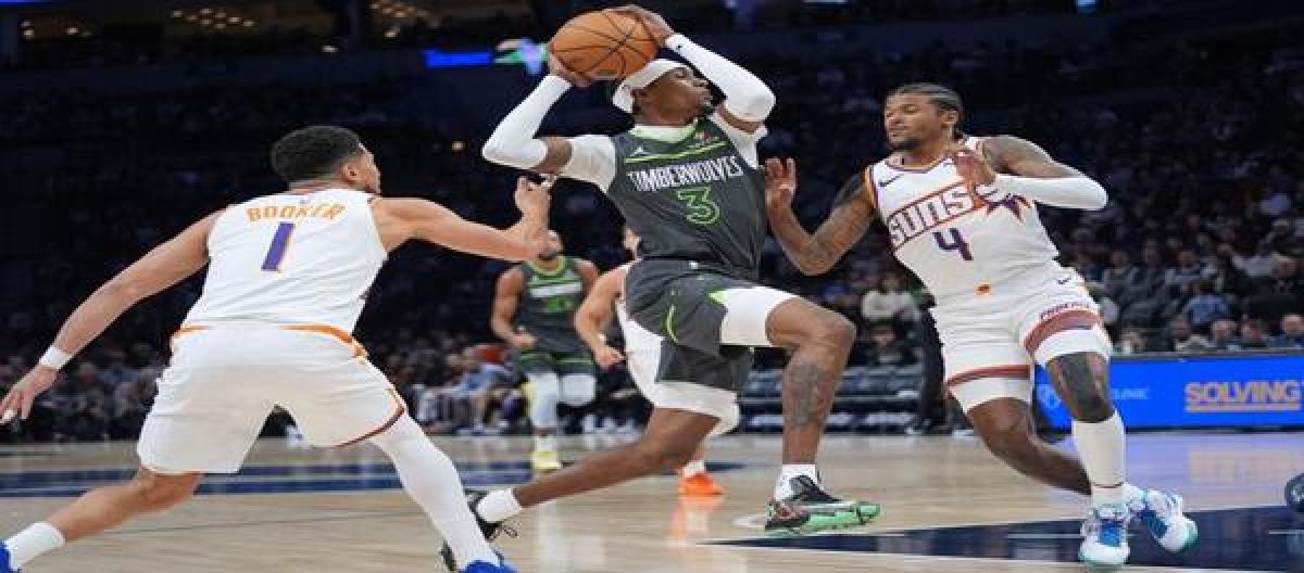 Booker's 34 points weren't enough to secure a Timberwolves 116-104 victory over the Suns.