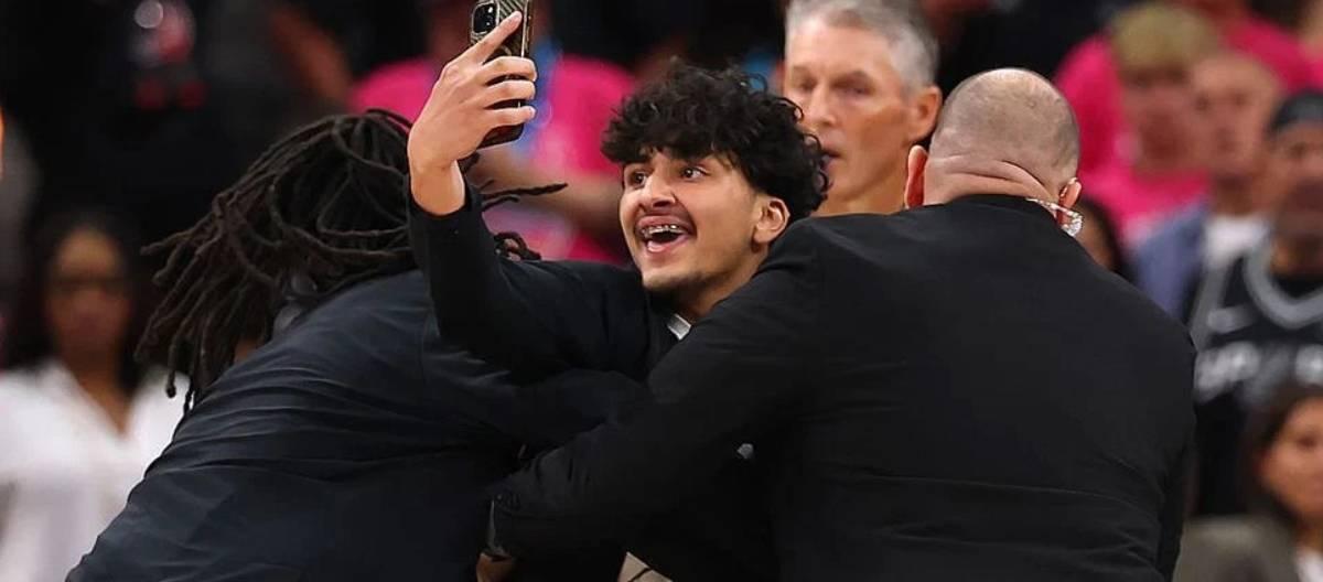 Two spectators banned for life worldwide by NBA for taking a selfie with Wenban