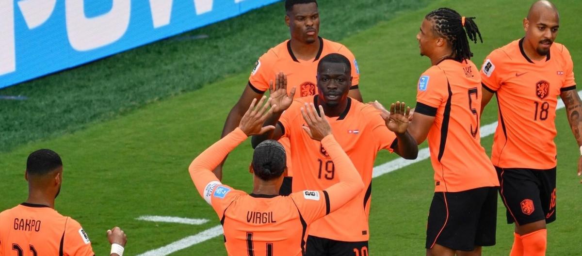 World Cup – Netherlands defeated Tunisia 3-1 to advance to the round of 32 as group winners.