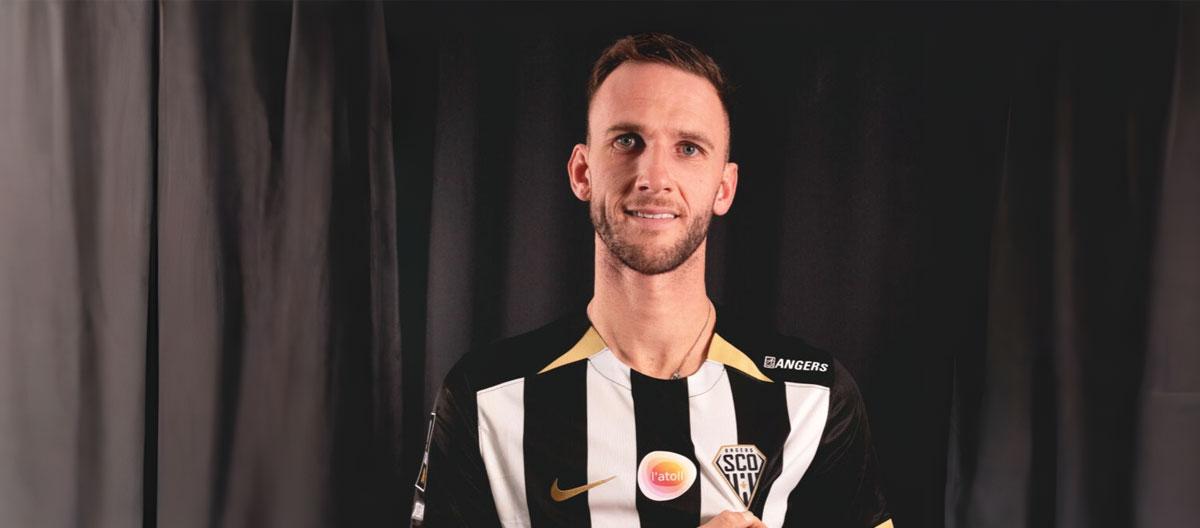 Angers triggered Ajax defensive midfielder Branco van den Boomen's buy-out clause..