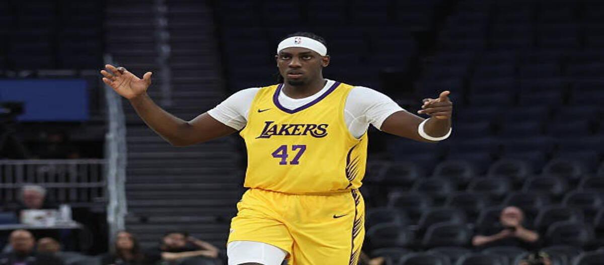 The Lakers sign Caruma to a two-way contract to begin his NBA journey.