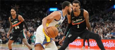 Stephen Curry scored 46 points as the Golden State Warriors defeated the San Antonio Spurs 125-120.