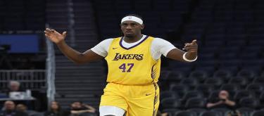 The Lakers sign Caruma to a two-way contract to begin his NBA journey.