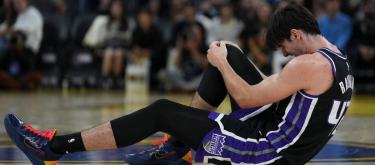 Sacramento Kings center Reno suffered a right patellar subluxation and is expected to have a follow-up examination in two weeks.